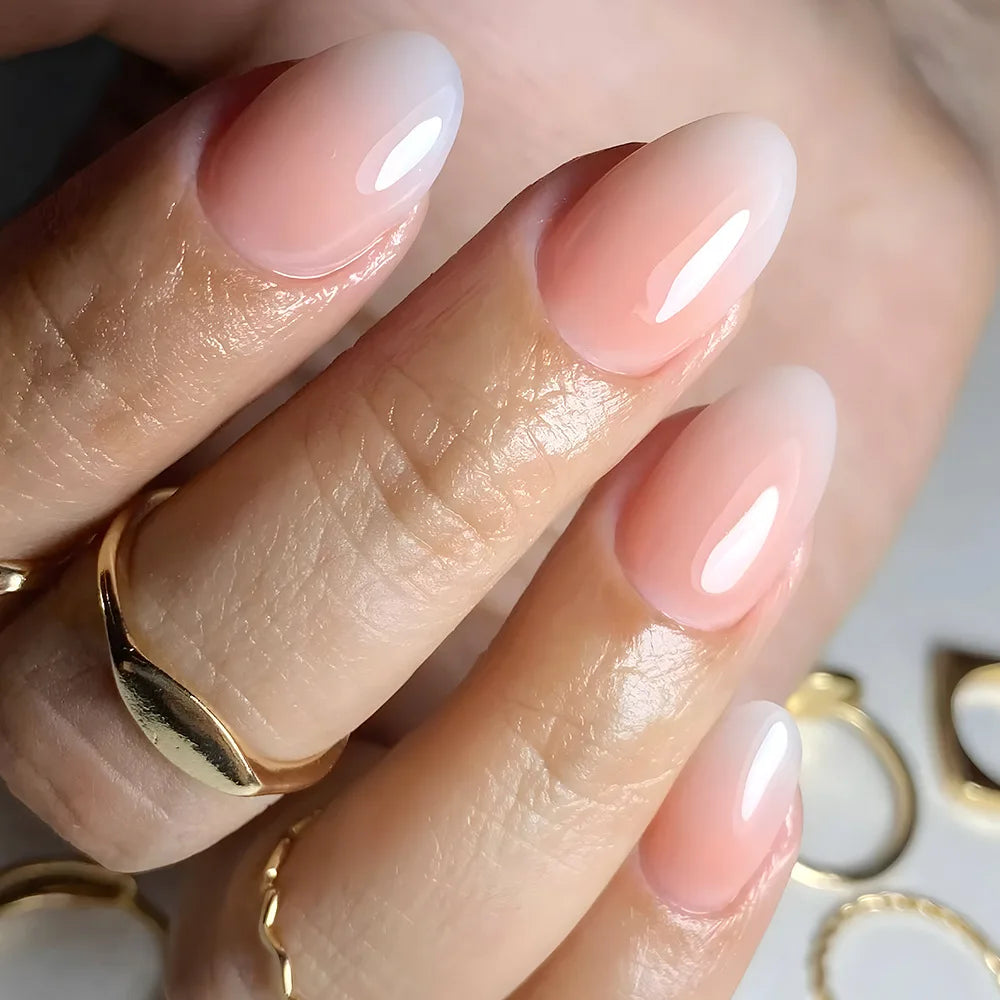 24Pcs Short Oval Head Blush Pink Press on Nails with Simple Designs Almond Nails Wearable Acrylic Full Cover Nail Tips with Glue