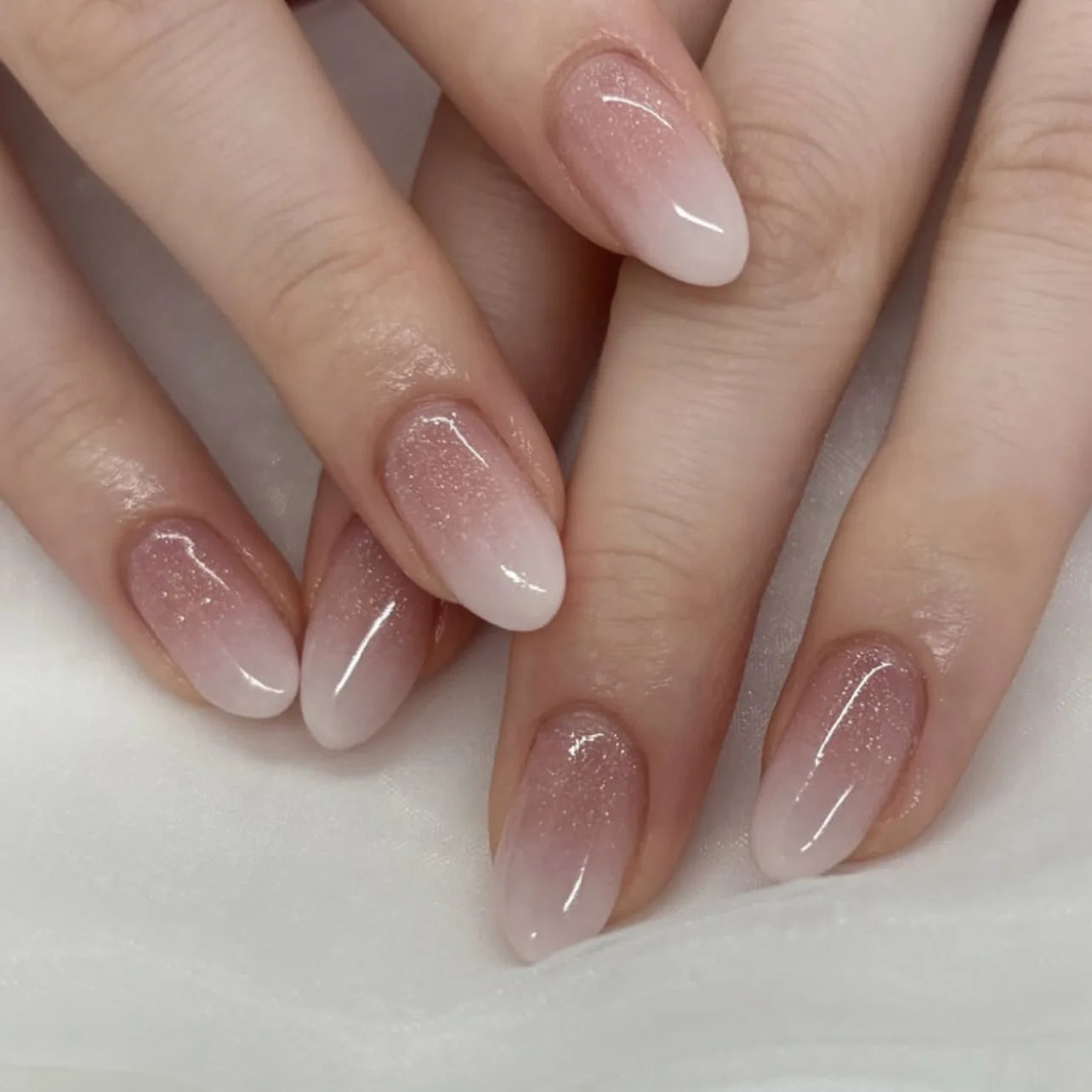 24Pcs Short Oval Head Blush Pink Press on Nails with Simple Designs Almond Nails Wearable Acrylic Full Cover Nail Tips with Glue