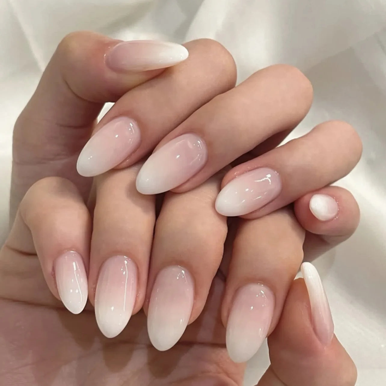 24Pcs Short Oval Head Blush Pink Press on Nails with Simple Designs Almond Nails Wearable Acrylic Full Cover Nail Tips with Glue